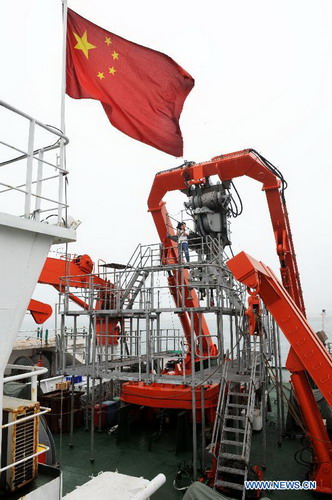 Mother vessel leaves Qingdao to receive <EM>Jiaolong</EM>