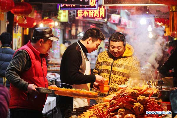 Qingdao's snacks prepared for Spring Festival celebrations