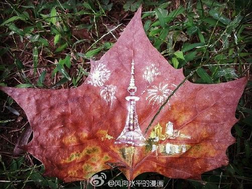 Paintings on fallen leaves showcase city beauty