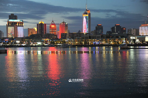 China's sailing city lights up at night