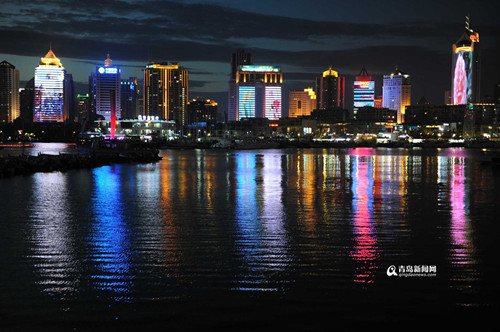China's sailing city lights up at night