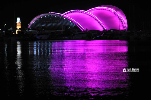 China's sailing city lights up at night