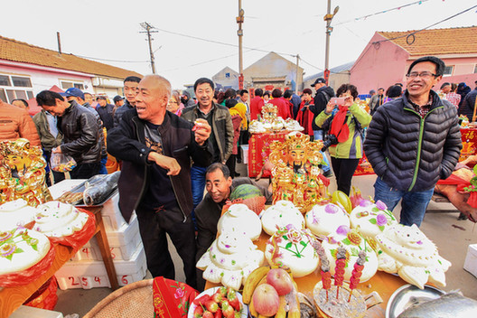 Fishermen mark sea ritual in E China's Shandong