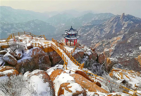 Qingdao welcomes first snow of the New Year