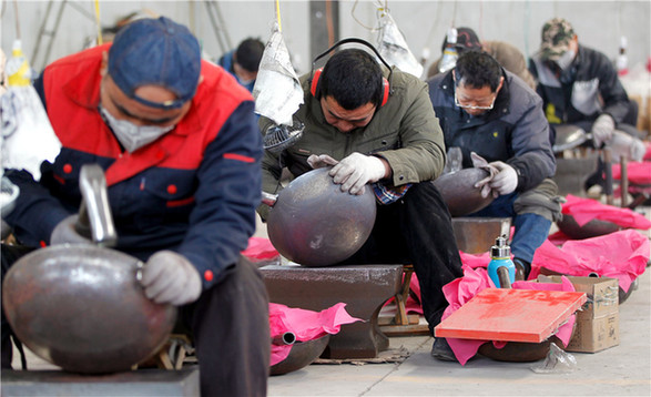 <EM>'A Bite of China'</EM> boosts sales of iron pans in E China